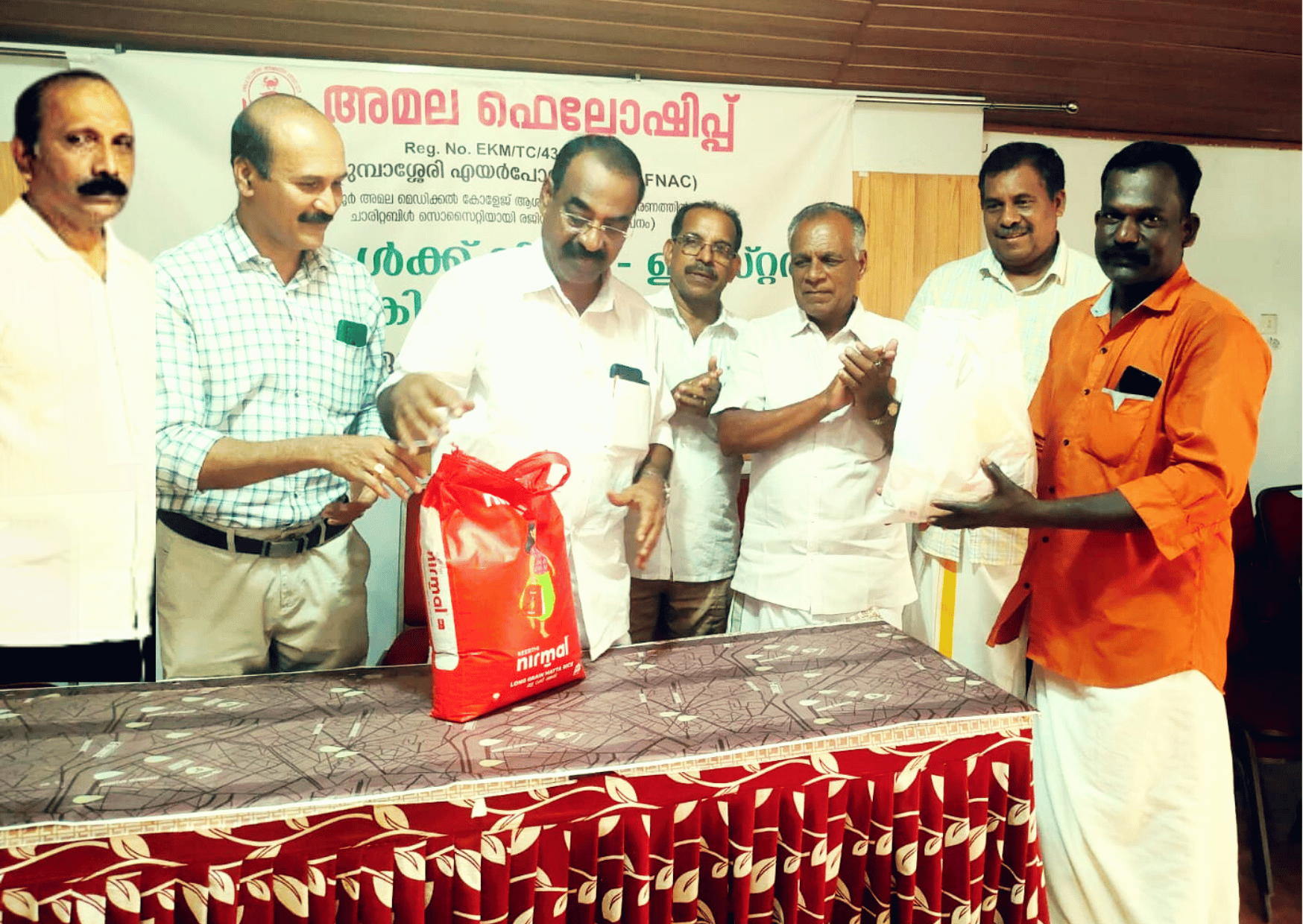 Amala Fellowship nedumbassery airport city distributed Student education scholarships, sponsored by CIAL, Distributed by Angmaly Munciplaity chairman Shio paul