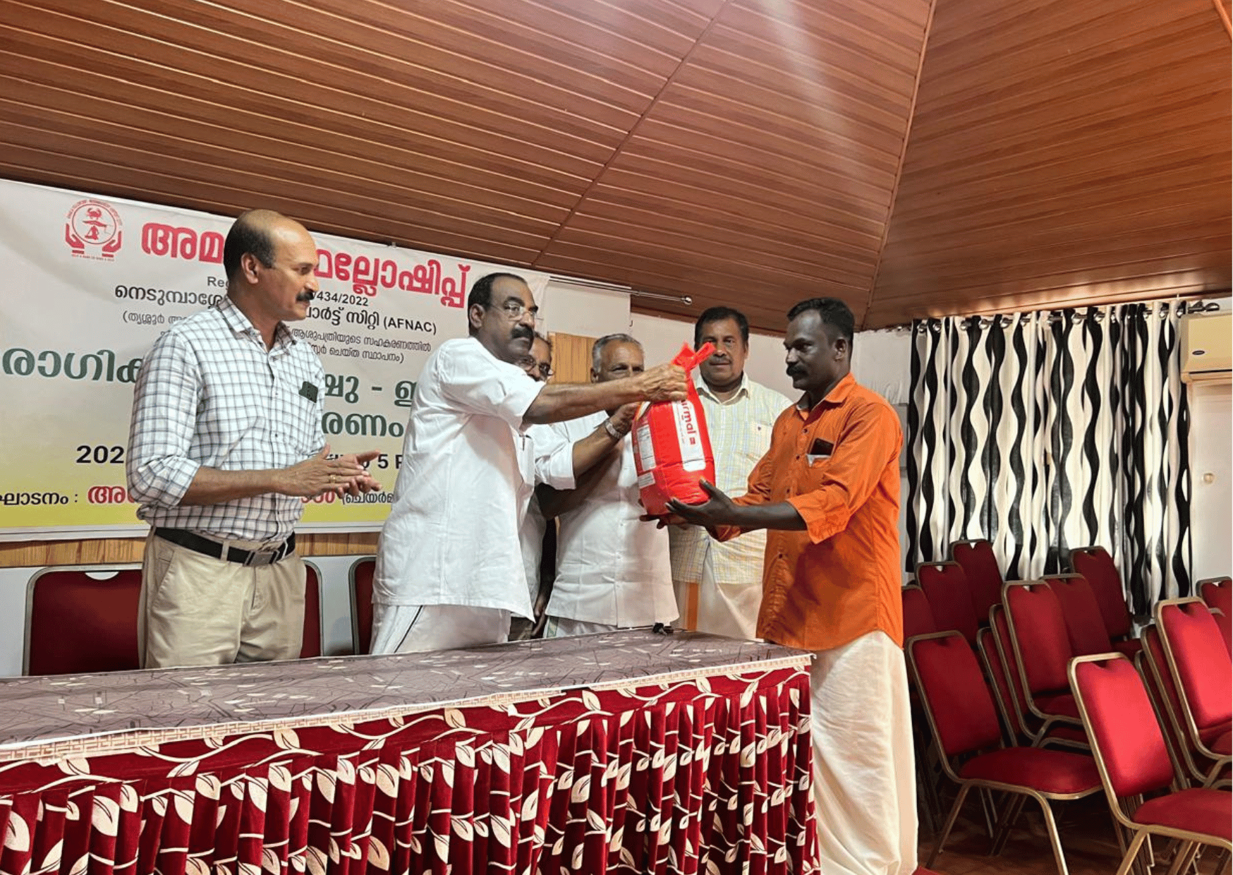 Amala Fellowship nedumbassery airport city distributed Student education scholarships, sponsored by CIAL, Distributed by Angmaly Munciplaity chairman Shio paul